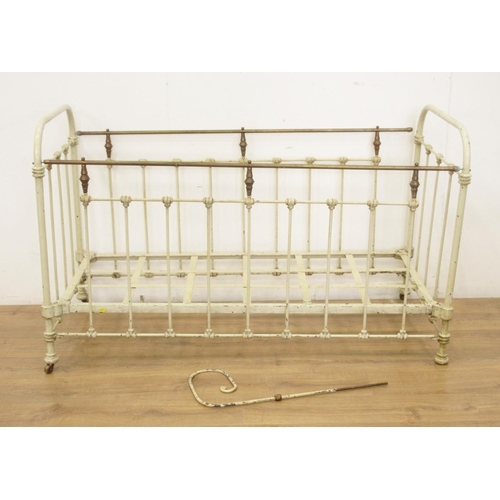 71 - Two cast and wrought iron Cots, one with brass rail