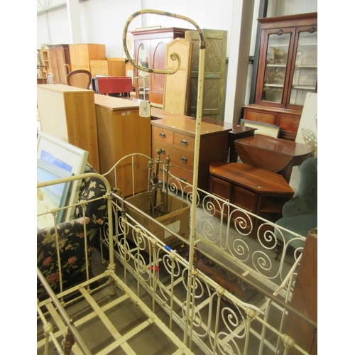 71 - Two cast and wrought iron Cots, one with brass rail