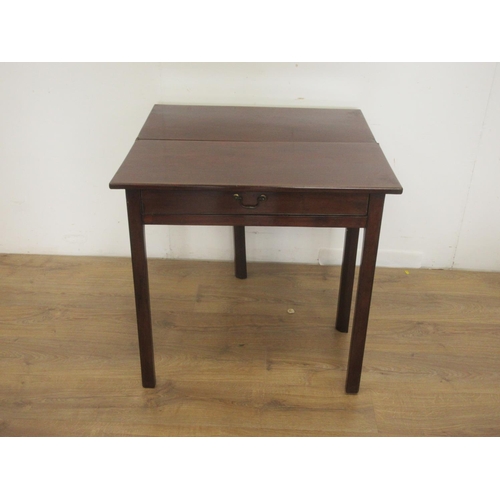 92 - A Georgian mahogany foldover Tea Table with rectangular top fitted frieze drawer on chamfered square... 