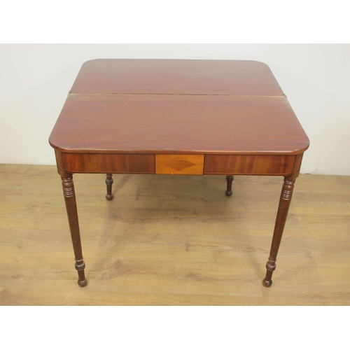 385 - A 19th Century mahogany fold-over Tea Table mounted upon turned supports 3ft W x 2ft 5in H