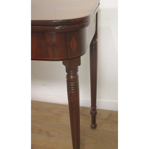 385 - A 19th Century mahogany fold-over Tea Table mounted upon turned supports 3ft W x 2ft 5in H