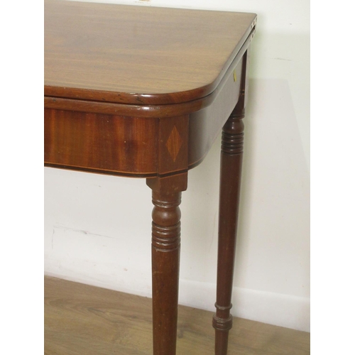 385 - A 19th Century mahogany fold-over Tea Table mounted upon turned supports 3ft W x 2ft 5in H