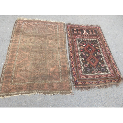 668 - A brown woollen Rug 5ft 3in x 3ft 6in and a Prayer type Rug 4ft 10in x 2ft 10in