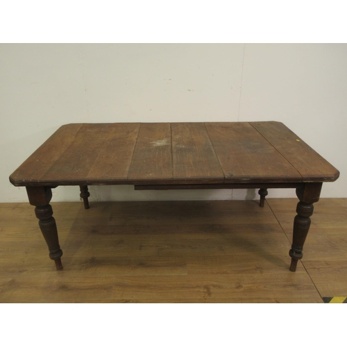 489 - A Victorian oak Dining Table on turned legs 5ft 10in W x 2ft 5in H