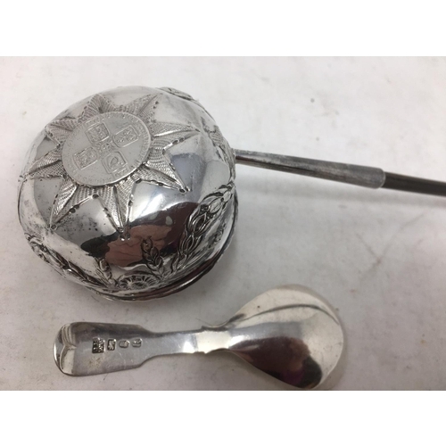 246 - A Georgian silver Toddy Ladle with swag embossing, coin inset bowl and spiral handle, and a Caddy Sp... 