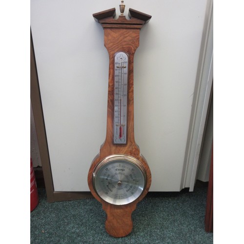 350 - A reproduction Aneroid Barometer and a quantity of various prints.