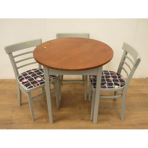 335 - A scrub top green painted circular Breakfast Table and four Chairs