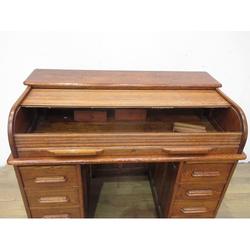 106 - An early 20th Century oak tambour fronted Desk (tambour A/F) 4ft W x 3ft 3in H