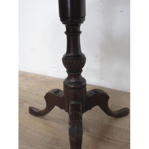 141 - A Georgian mahogany circular Pillar Table on shell carved tripod supports 2ft 9in D x 2ft 4in H