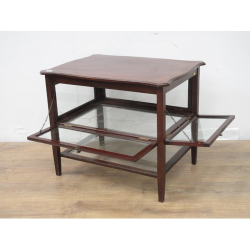 143 - An Edwardian mahogany Table Display Cabinet with glazed sides and shaped top mounted upon square cut... 