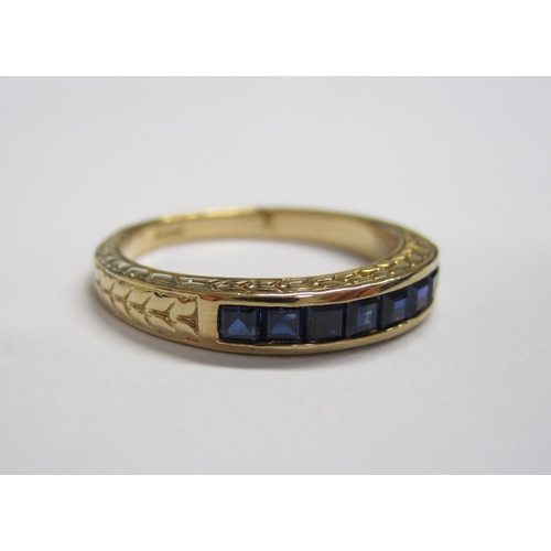 160 - A Sapphire half Eternity Ring channel-set calibre-cut stones in 9ct gold ring size P