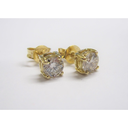 169 - A pair of Diamond Ear Studs each claw-set brilliant-cut stone, total diamond weight 0.80cts, in 18ct... 