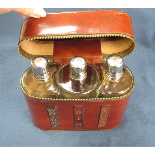 241 - Set of three glass Spirit Flasks in Italian leather travelling case