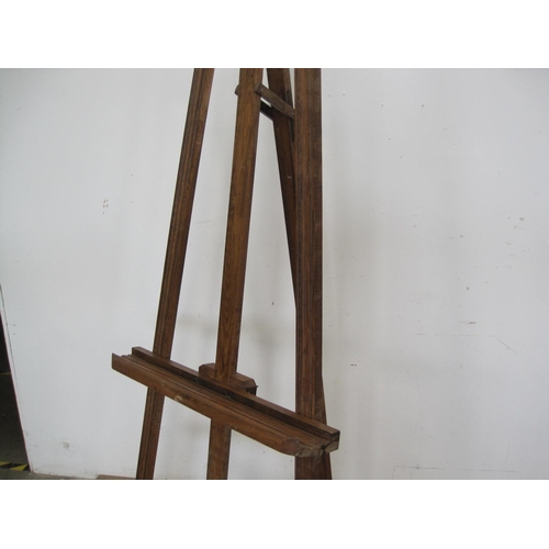 285 - An oak adjustable Easel, 20th Century, height 72in H