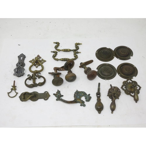 3 - A quantity of antique brass Furniture Handles, Knobs and Casters including droppers