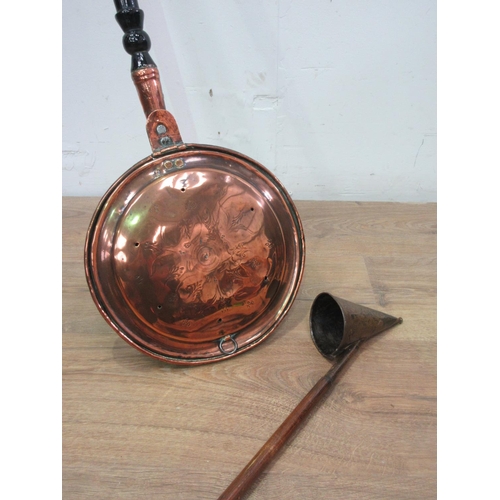 323 - An 18th Century Warming Pan with ebonised handle, an antique long handled Candle Snuffer, an antique... 