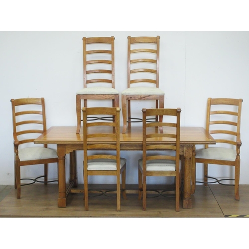 330 - A modern hardwood Refectory Table and six Dining Chairs