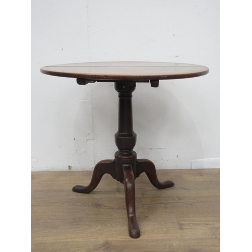 338 - A Georgian elm Pillar Table with two plank circular top on barrel turned column and tripod base 2ft ... 