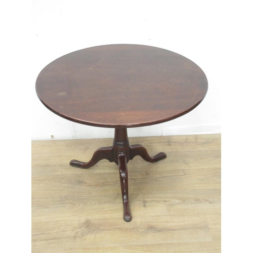 339 - A George III mahogany Pillar Table with single piece top on turned column and tripod base 2ft 10in D... 