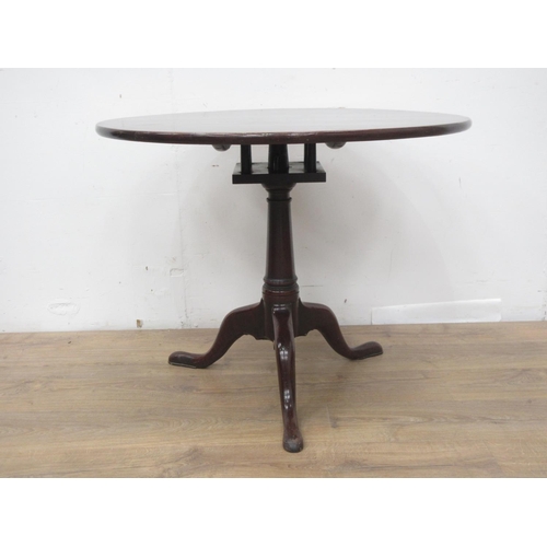 339 - A George III mahogany Pillar Table with single piece top on turned column and tripod base 2ft 10in D... 