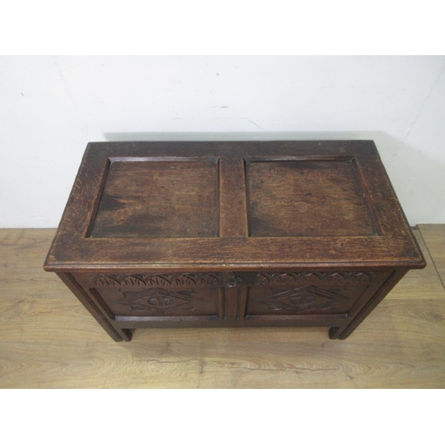 378 - A 17th Century oak Coffer with two panel sunken lid and arched frieze with two diamond carved front ... 