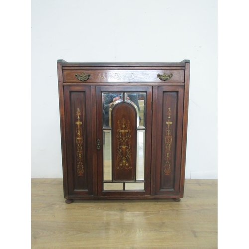 387 - An Edwardian Rosewood Cabinet with marquetry inlay, fitted frieze drawer above a mirror panelled doo... 