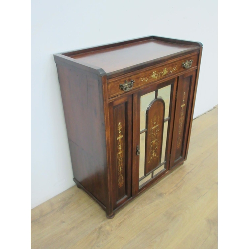 387 - An Edwardian Rosewood Cabinet with marquetry inlay, fitted frieze drawer above a mirror panelled doo... 