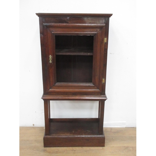 388 - An oak Cupboard, with single door (lacks panel) enclosing a shelf on potboard base, 4ft 9in H x 2ft ... 