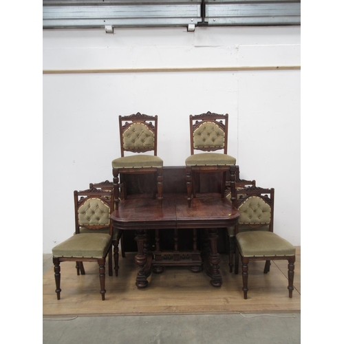 393 - An Edwardian extending Dining Table including three leaves and a set of six Edwardian Dining Chairs ... 