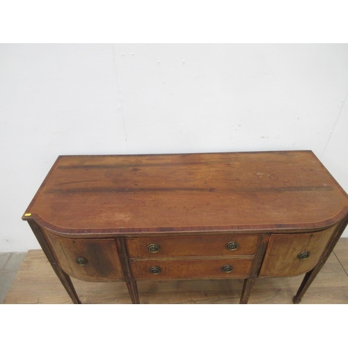 403 - A 19th Century mahogany Sideboard with shaped front fitted drawers and cupboards on squared tapering... 