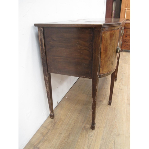 403 - A 19th Century mahogany Sideboard with shaped front fitted drawers and cupboards on squared tapering... 