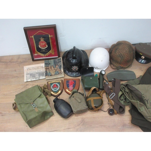 404 - A box two metal military helmets, a Fireman's Helmet, Soviet military Hat, Regimental Plaques, water... 