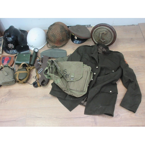 404 - A box two metal military helmets, a Fireman's Helmet, Soviet military Hat, Regimental Plaques, water... 