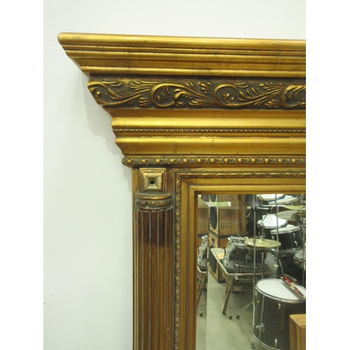 41 - A modern large gilt framed over mantel Mirror with moulded cornice and Corinthian columns 5ft 8in H ... 