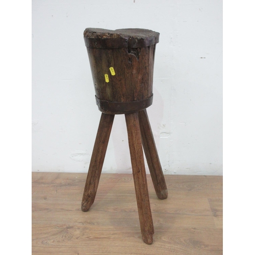 413 - An antique splitting Block on three legs 2ft 3in H