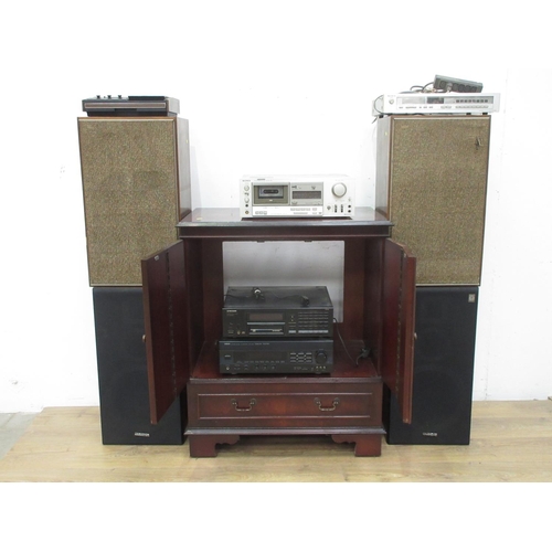 419 - A mahogany veneered Hi-Fi Cabinet, Sony Music System and two pairs of Speakers, passed PAT test