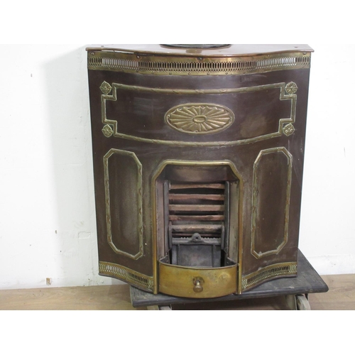 446 - A brass and copper Fireplace with serpentine front, pierced frieze and raised decoration, 2ft 5in H ... 