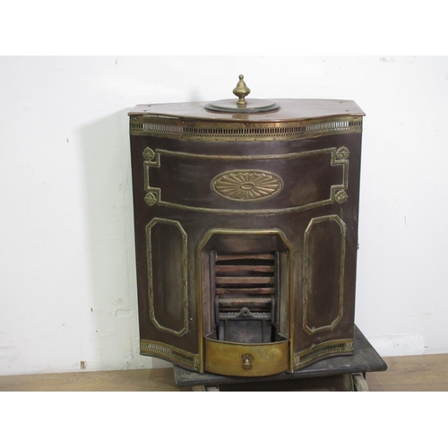 446 - A brass and copper Fireplace with serpentine front, pierced frieze and raised decoration, 2ft 5in H ... 