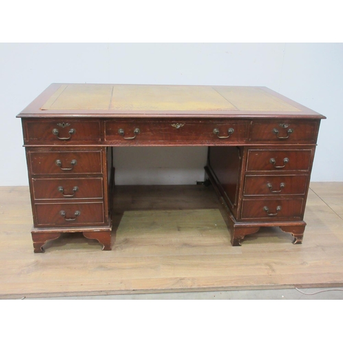 451 - A large reproduction pedestal Desk with inset writing surface and fitted nine drawers, 5ft W x 3ft