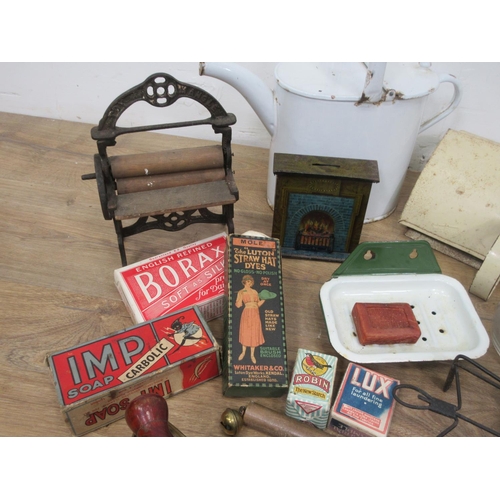 452 - A box of various items including a miniature Cricket bat, a rounders Bat, an enamel Watering Can, a ... 