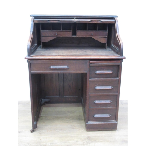 454 - An oak small Roll-top Desk with fitted interior and fitted five drawers, 3ft W