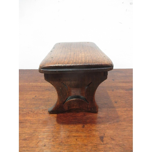 467 - A small 18th Century oak Stool with rectangular top and shaped supports, 10in