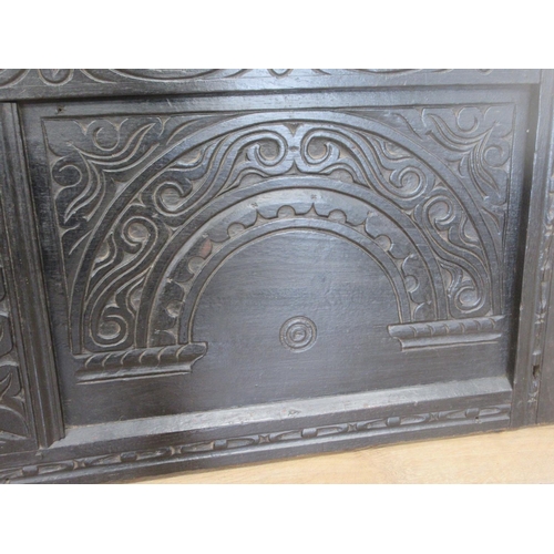 475 - An antique oak front Panel from a coffer with carved designs, 4ft W