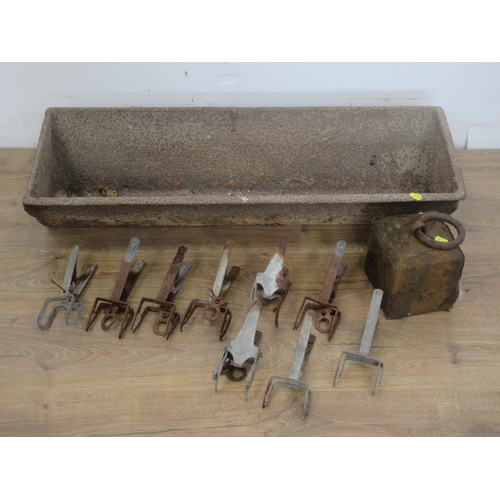 486 - A cast iron Feed Trough 3ft W, nine Mole Traps and a Weight