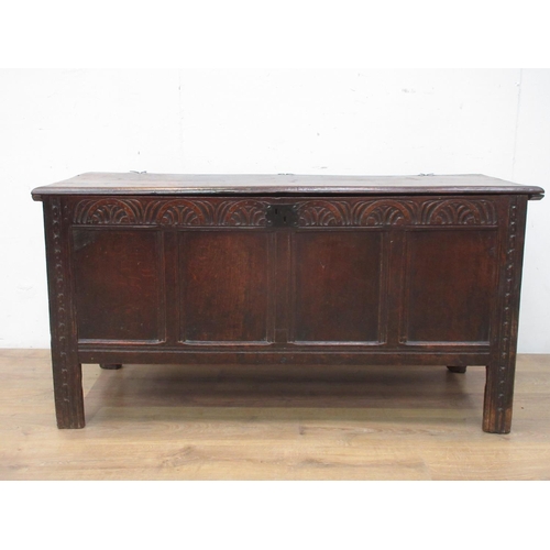 500 - A late 17th Century oak Coffer with two plank lid above four panel front 4ft 7in W x 2ft 4in H