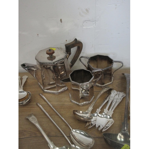 505 - A box including silver plated three piece Tea Service and a quantity of Cutlery