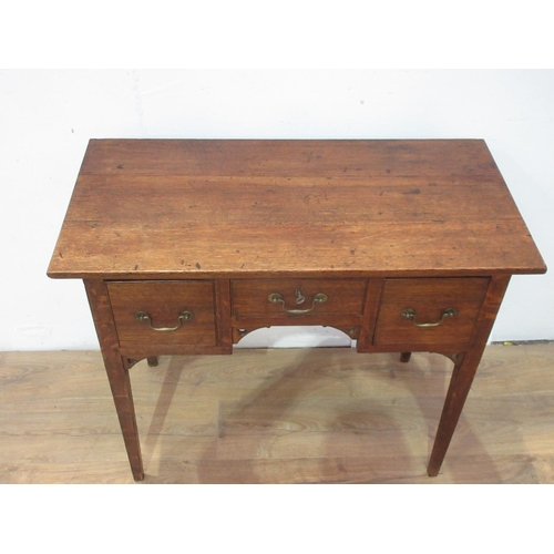 506 - An 18th Century oak Lowboy fitted three drawers on square cut supports 2ft 11in W x 2ft 7in H