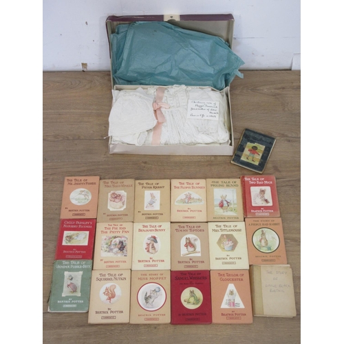 517 - A Victorian Christening Robe and a quantity of Beatrix Potter Books