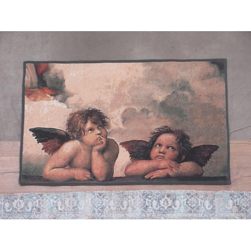 551 - A modern Wall Hanging depicting a cherub and a Rug