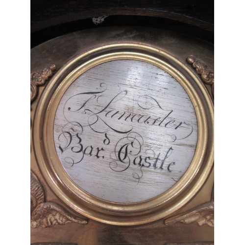 554 - A Georgian Longcase Clock with carved oak case and brass arched dial by T. Lancaster Bar'd Castle 7f... 